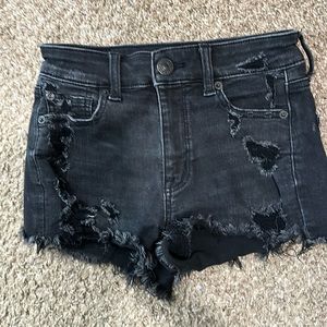 American eagle nex(x)t level stretch black denim distressed shorts.
